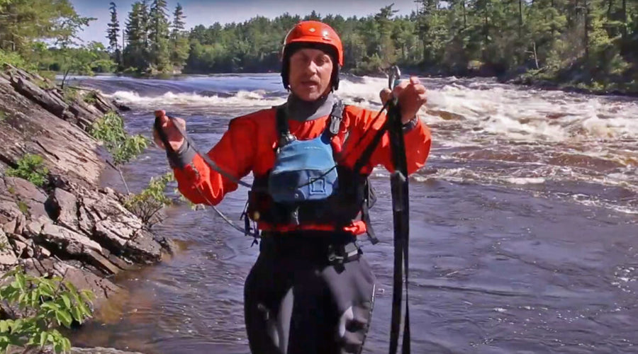 how to carry your webbing flip line  Man holds webbing flip line for demonstration