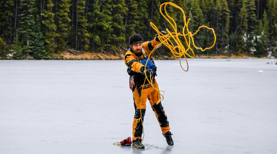 throw bag POV of paddler in whitewater getting thrown a rope POV of kayaker receiving a throw rope