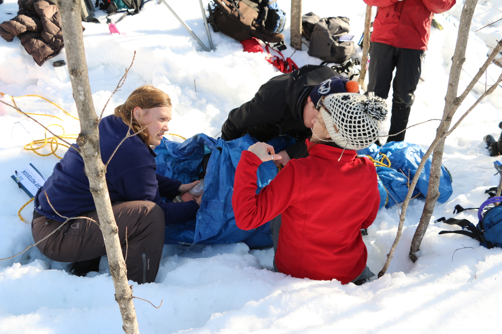 students at work in Wilderness First Responder simulation